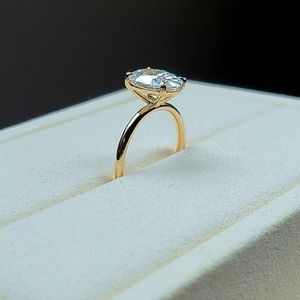Solid 14k gold 2.2ct (E VVS2) lab oval diamond ring